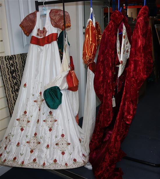 Cenerentola: Two red crushed velvet tail jackets with appliqué embroidered white collar, together with three